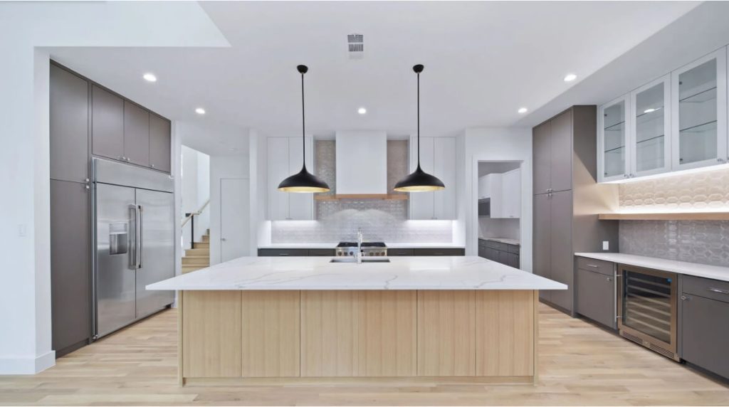 This kitchen remodeling project in Los Angeles, CA, transformed a traditional space into a modern, functional, and stylish area. Our team upgraded the cabinetry, added premium countertops, and installed energy-efficient appliances to create a seamless cooking and dining experience.